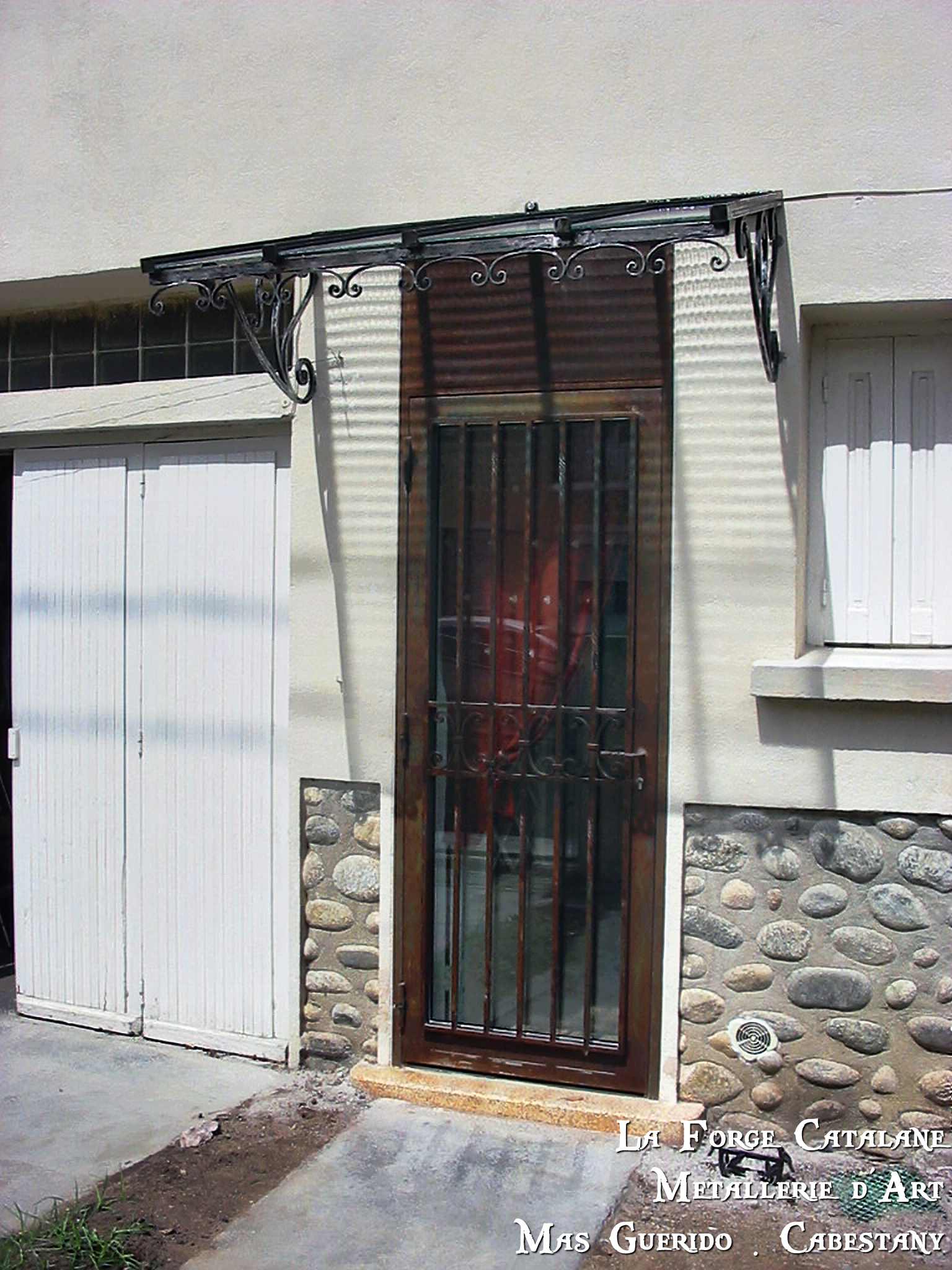 Marquise fer classique et volutes Forge Catalane.jpg